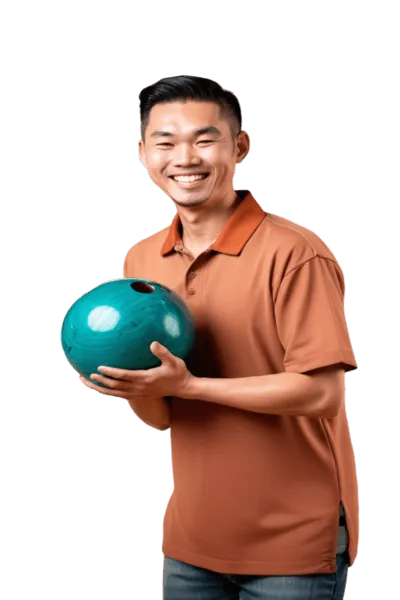 Smiling man holding a bowling ball